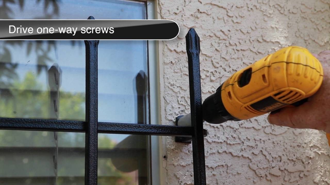 Window security grilles installation in progress
